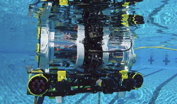 Cal State LA's autonomous underwater vehicle submerged in a pool